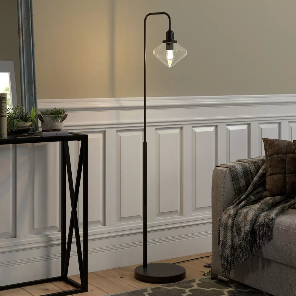 Łukowa lampa podłogowa z szklanym abażurem o oryginalnym kształcie