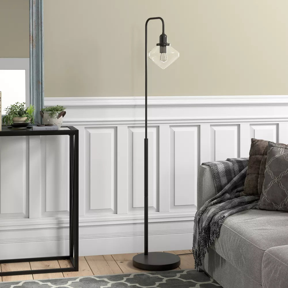 Łukowa lampa podłogowa z szklanym abażurem o oryginalnym kształcie